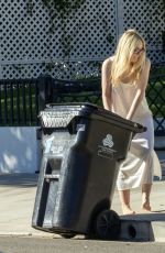 DAKOTA FANNING Takes in Her Trash Bin in Los Angeles 10/31/2025