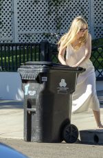 DAKOTA FANNING Takes in Her Trash Bin in Los Angeles 10/31/2025