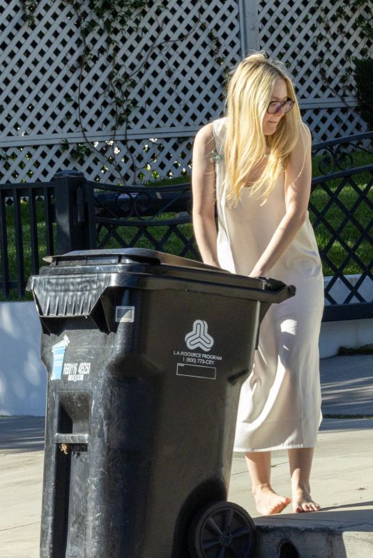 DAKOTA FANNING Takes in Her Trash Bin in Los Angeles 10/31/2025