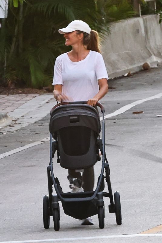 GISELE BUNDCHEN Out with Her Baby and Dog in Miami 11/17/2025