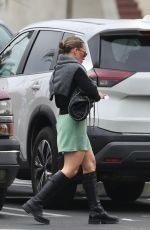 HILARY DUFF in a Kneehigh Boots and Green Skirt Out in Los Angeles 11/12/2025