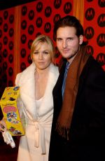 JENNIE GARTH at Motorola 6th Anniversary Holiday Party in Los Angeles 12/02/2004