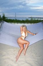 KATIE SIGMOND at a Photoshoot, October 2025