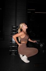 KATIE SIGMOND at a Photoshoot, October 2025