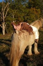 KATIE SIGMOND at a Photoshoot, October 2025