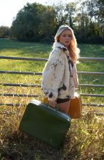 KATIE SIGMOND at a Photoshoot, October 2025