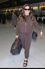 KELLY BROOK MChecks in with Singapore Airlines at Heathrow Airport in London 11/08/2025