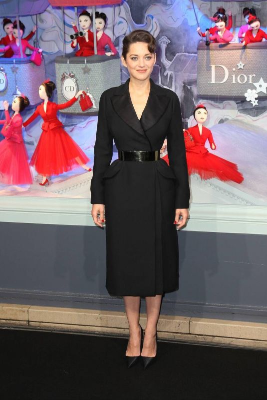 MARION COTILLARD at Launching of Christmas Illuminations of Dior at le Printemps Haussman in Paris 11/09/2012