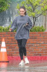 MILA KUNIS Sports Taylor Swift Tour Sweatshirt Out in Los Angeles 11/17/2025
