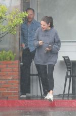 MILA KUNIS Sports Taylor Swift Tour Sweatshirt Out in Los Angeles 11/17/2025