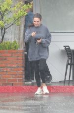 MILA KUNIS Sports Taylor Swift Tour Sweatshirt Out in Los Angeles 11/17/2025