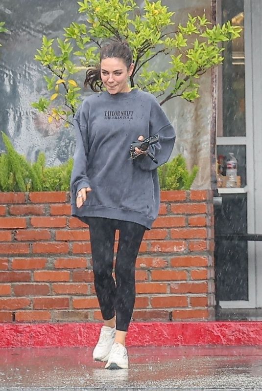MILA KUNIS Sports Taylor Swift Tour Sweatshirt Out in Los Angeles 11/17/2025