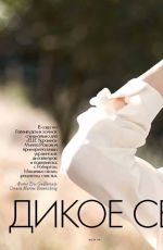 MILLA JOVOVICH in ELLE Ukraine, July 2013