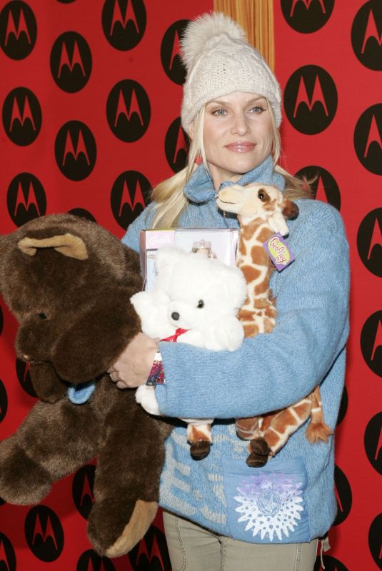 NICOLETTE SHERIDAN at Motorola 6th Anniversary Holiday Party in Los Angeles 12/02/2004