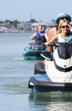 SYDNEY SWEENEY in Bikini Riding Jet Skis with Friends in Florida 11/24/2025