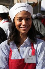 ZOE SALDANA at Thanksgiving Lunch for Homeless in Los Angeles 11/25/2009
