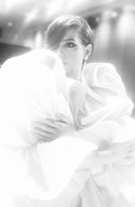 ANNE HATHAWAY at a Photoshoot 12/10/2025