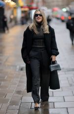 ASHLEY ROBERTS Arrives at Heart Radio Studio in London 12/18/2025
