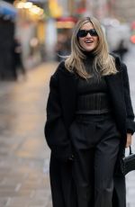 ASHLEY ROBERTS Arrives at Heart Radio Studio in London 12/18/2025