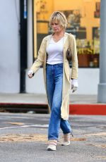 DAKOTA JOHNSON Meets up With Mom MELANIE GRIFFITH for Christmas Shopping in Los Angeles 12/23/2025