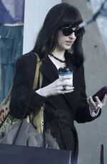 DAKOTA JOHNSON Out Shopping at Melrose Place in West Hollywood 12/27/2025