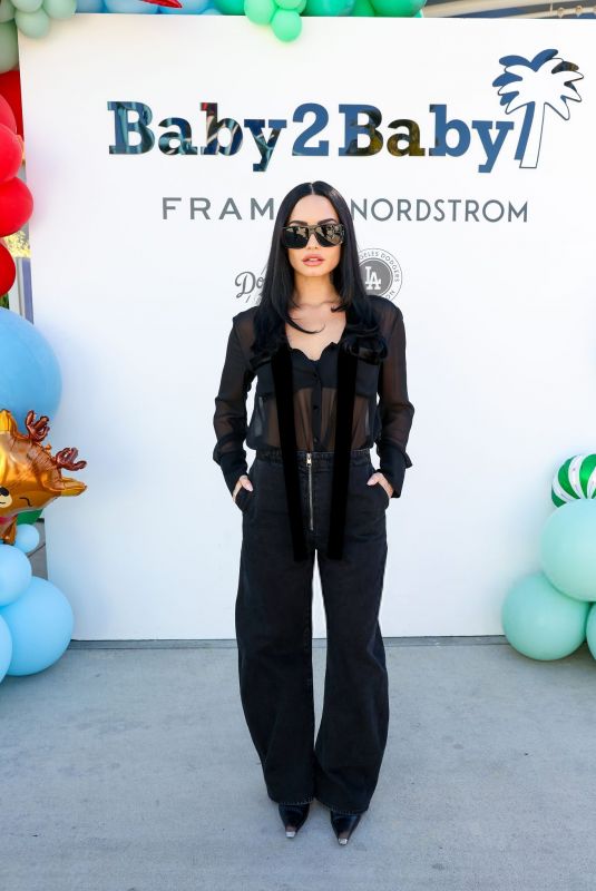 DEMI LOVATO at 2025 Baby2Baby Holiday Distribution at Dodger Stadium in Los Angeles 12/10/2025