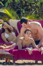 DUA LIPA in Bikini at a Beach in Mexico 12/20/2025