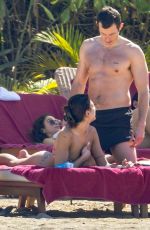 DUA LIPA in Bikini at a Beach in Mexico 12/20/2025