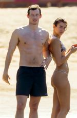 DUA LIPA in Bikini at a Beach in Mexico 12/20/2025