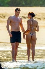 DUA LIPA in Bikini at a Beach in Mexico 12/20/2025