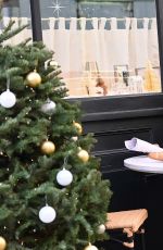 EMILY RATAJKOWSKI at Kerastase Holiday Cafe Pop-up in New York City 12/11/2025