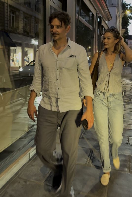 GIGI HADID and Bradley Cooper Out in Paris 06/28/2025