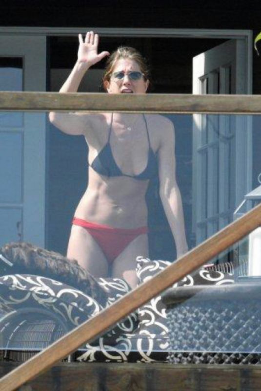 JENNIFER ANISTON in Bikini at Her Home in Los Angeles 12/19/2025