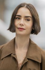 LILY COLLINS Arrives at Austerlitz Train Station in Paris 12/14/2025