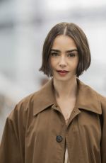 LILY COLLINS Arrives at Austerlitz Train Station in Paris 12/14/2025