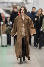 LILY COLLINS Arrives at Austerlitz Train Station in Paris 12/14/2025