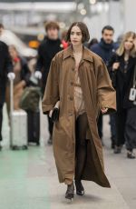 LILY COLLINS Arrives at Austerlitz Train Station in Paris 12/14/2025
