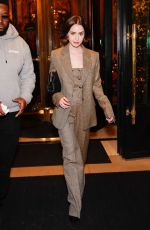 LILY COLLINS Leaves Her Hotel in Paris 12/14/2025