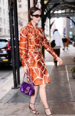 LILY COLLINS Outside Good Morning America Studio in New York City 12/10/2025