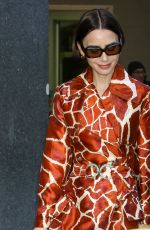 LILY COLLINS Outside Good Morning America Studio in New York City 12/10/2025
