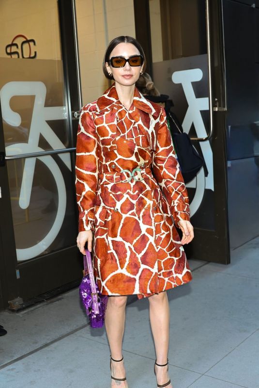 LILY COLLINS Outside Good Morning America Studio in New York City 12/10/2025