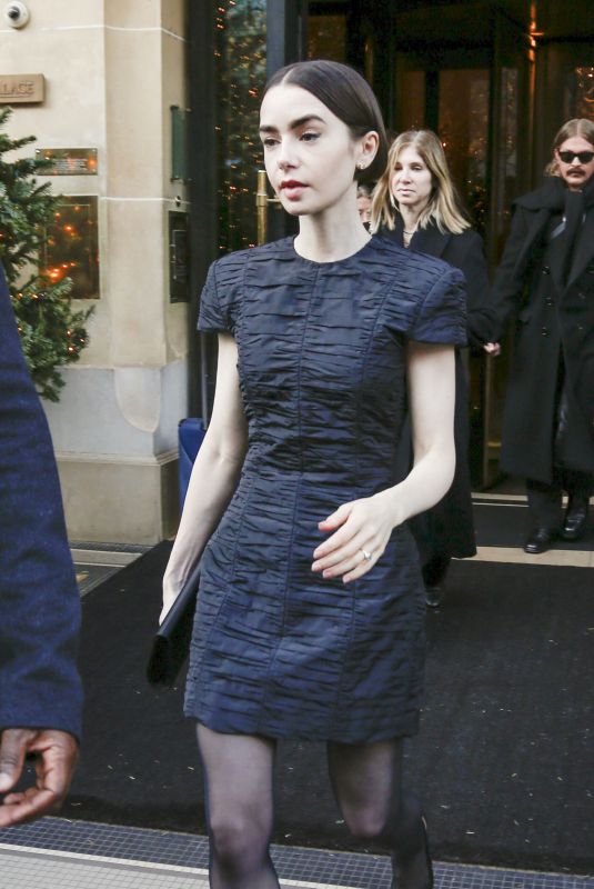 LILY COLLINS Outside of Her Hotel in Paris 12/15/2025