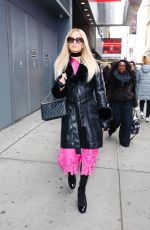 PARIS HILTON Arrives for Her T-Mobile No Filter Series Launch in Times Square 12/13/2025
