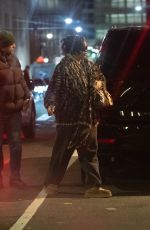 RIHANNA Enjoys a Late-night Stroll with a Friend in New York City 12/02/2025