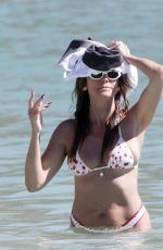 HEIDI KLUM in Bikini at a Beach in St Barths 12/28/2025