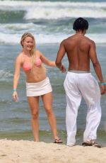 ZARA LARSSON in Bikini at a Beach in Rio de Janeiro 09/19/2024
