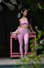 CAYLEE COWAN at a Photoshoot for Alo in Los Angeles 02/09/2026