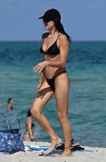 IRINA SHAYK in Bikini at a Beach in Miami 02/15/2026