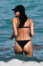 IRINA SHAYK in Bikini at a Beach in Miami 02/15/2026