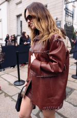 LILY JAMES Arrives at  Tod